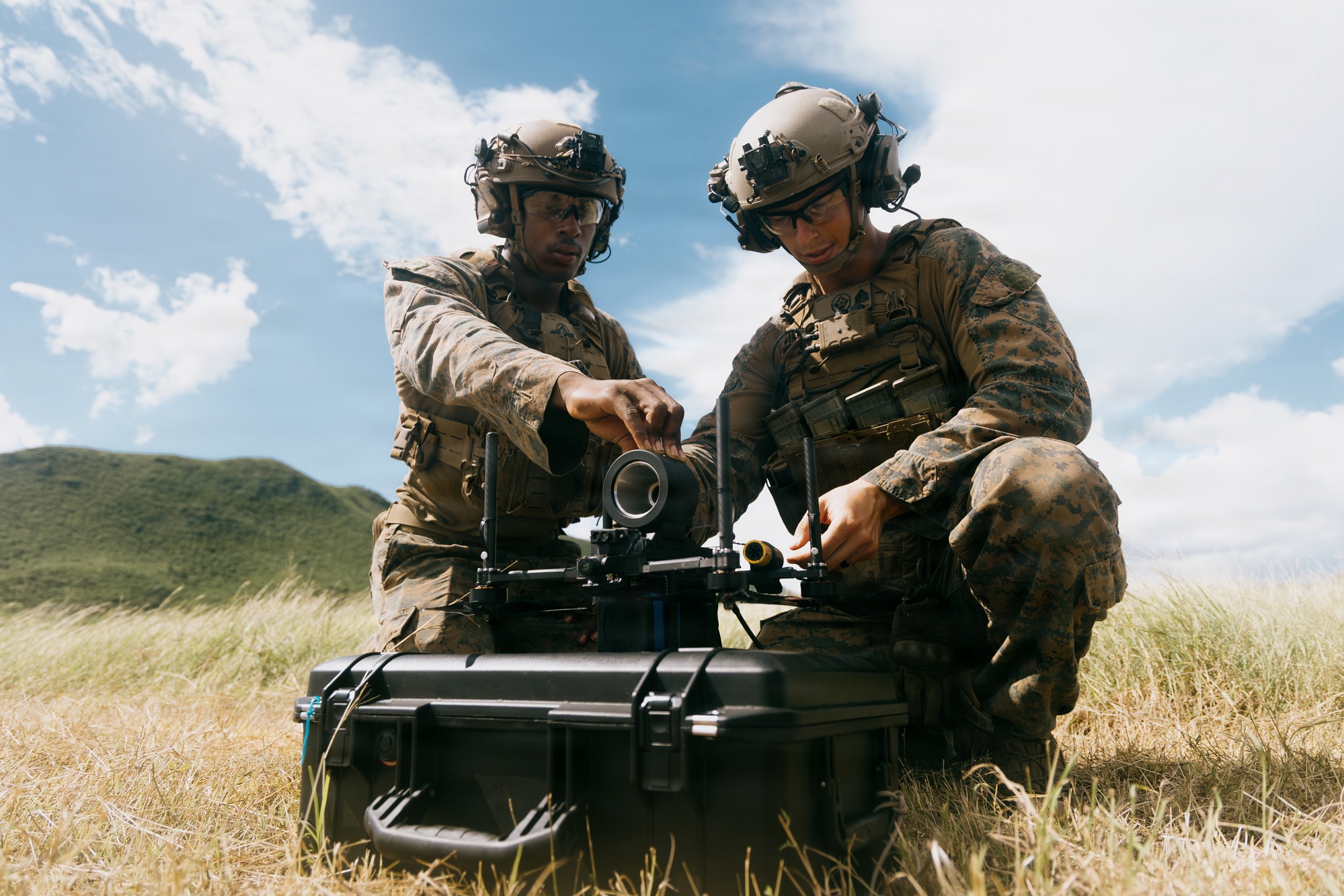 U.S. Marine Corps riflemen load a simulated warhead onto a Neros Archer FPV drone during training on Camp Santiago, Puerto Rico